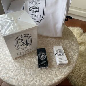 Brand new Diptyque 34 candle. Giftable condition.